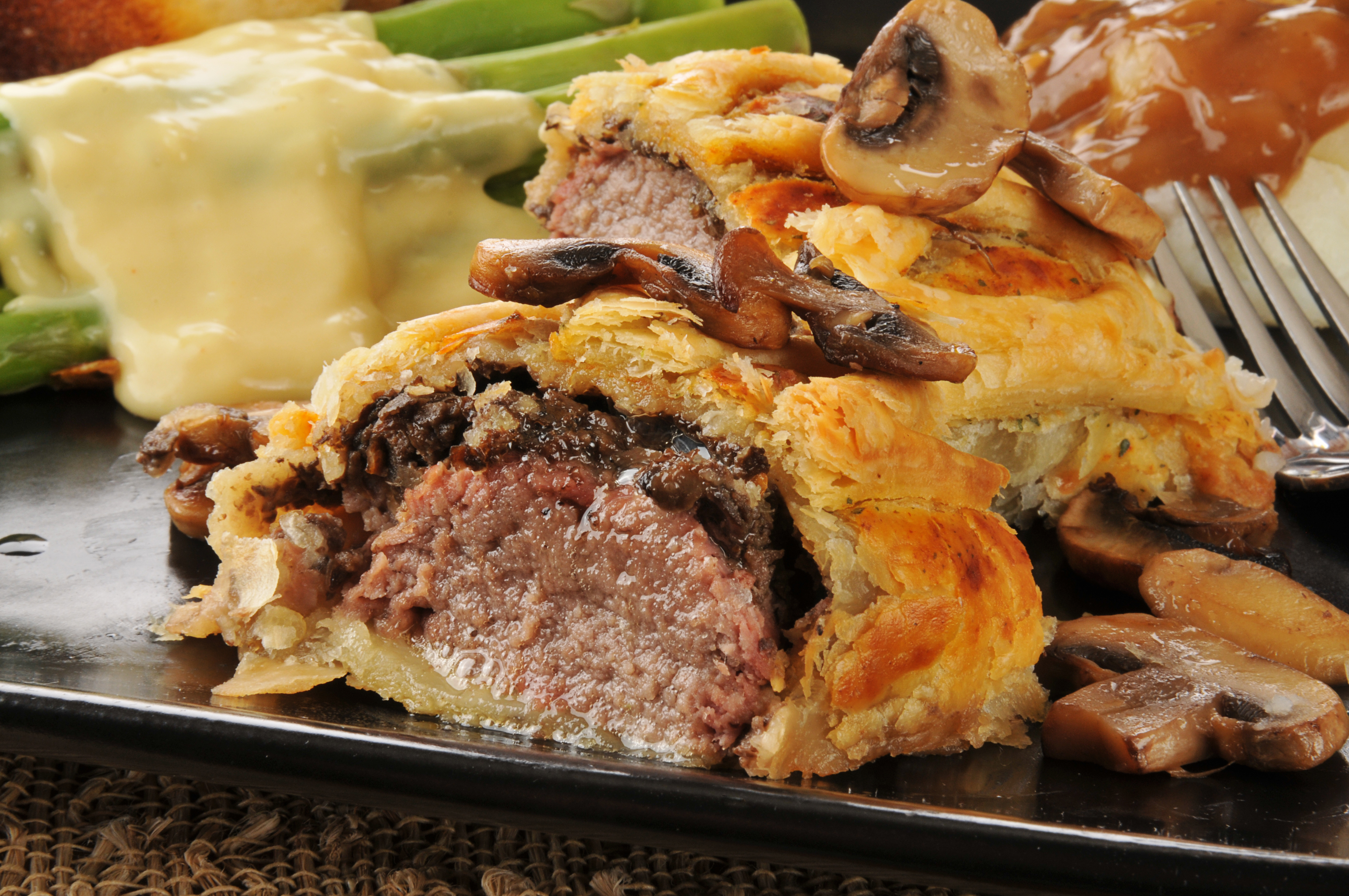 Beef-Wellington-with-wild-mushrooms-and-madeira-sauce